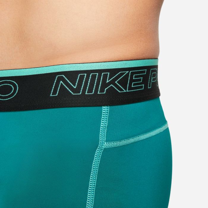 turquoise nike pros